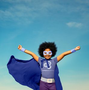 Superhero Girl Jumping Boxed